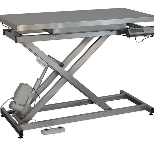 Electric consultation table with integrated weighing