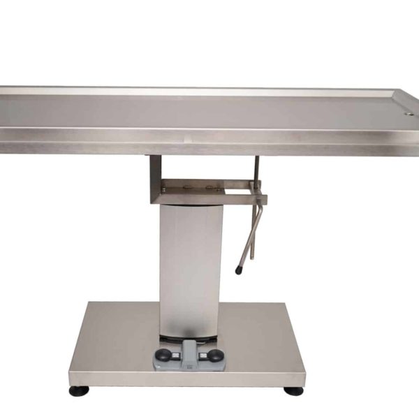 Surgery table with central electric column and two evacuation trays