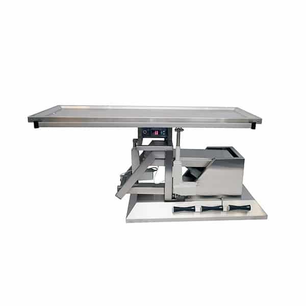 Surgery table with third direction tilt and warming plate with two drains